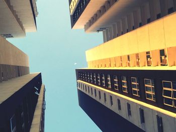 Low angle view of buildings against clear sky