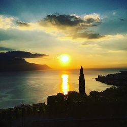 Scenic view of sea at sunset