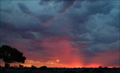 Scenic view of dramatic sky during sunset