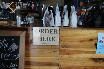 Information sign board on table in restaurant