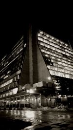 Low angle view of illuminated building at night