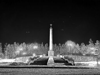 View of illuminated monument against sky at night