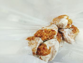 Close-up of food in white fabric