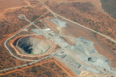 High angle view of road passing through land