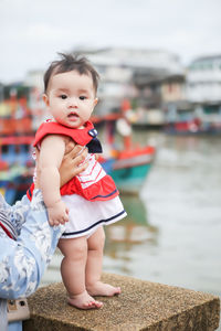 Portrait of cute girl looking away