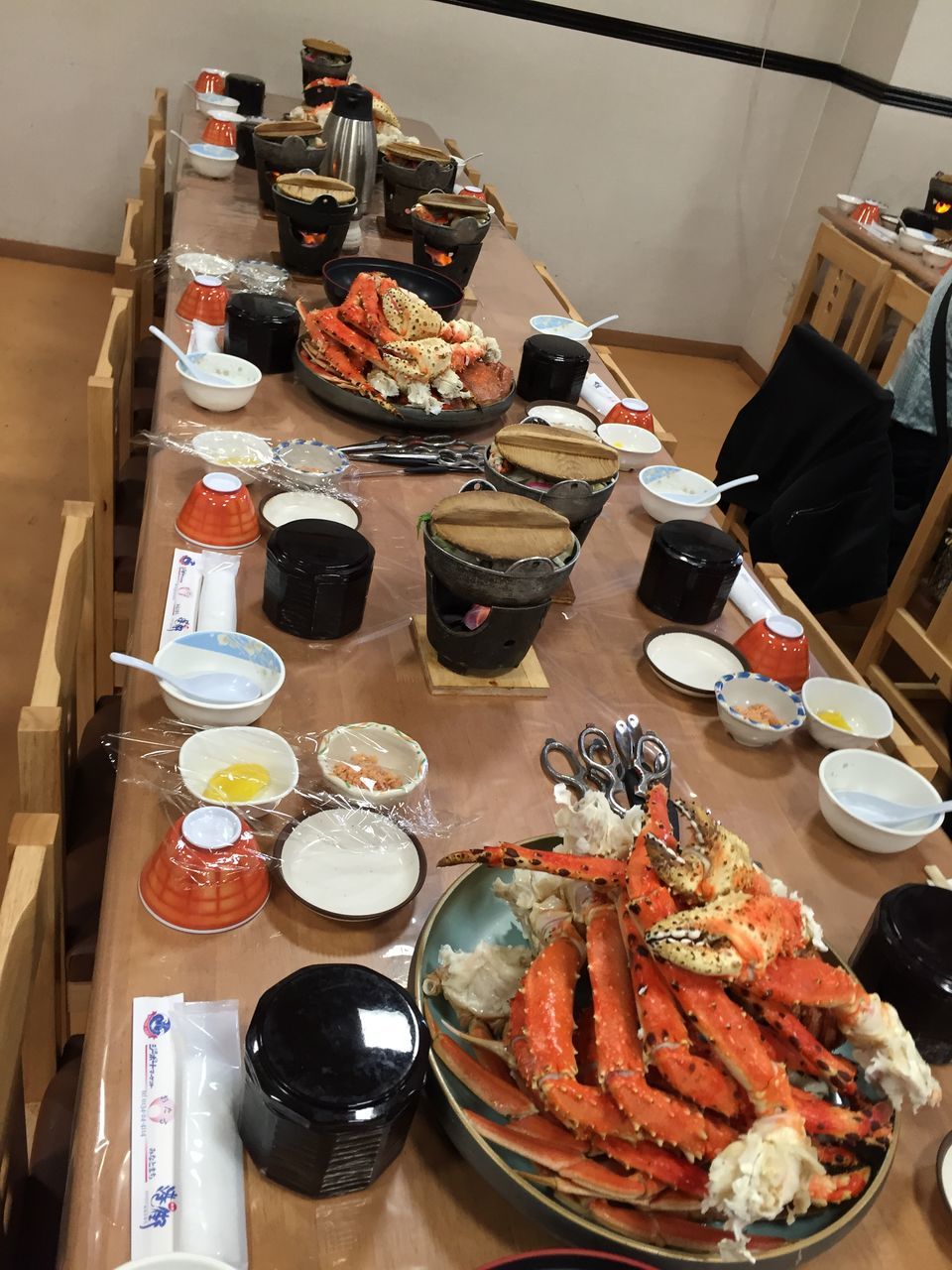 indoors, high angle view, still life, food and drink, large group of objects, machinery, equipment, technology, no people, industry, abundance, metal, table, close-up, food, variation, stack, arrangement, container, machine part