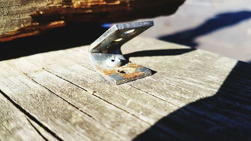 Close-up of metal on table