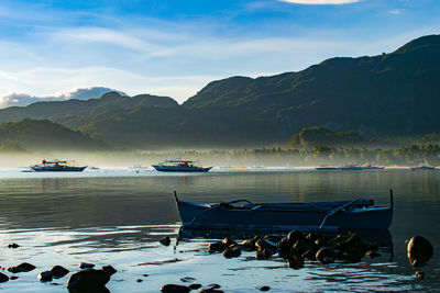 Fog over sabang beach in early morning as seen across the water