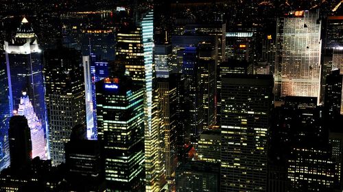 Illuminated cityscape at night