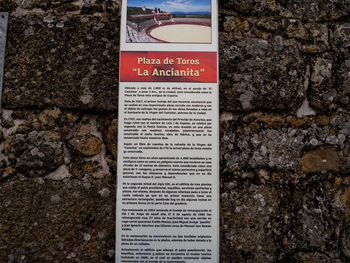 Close-up of warning sign on wall