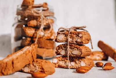 Traditional italian cantuccini cookies with almonds in glass jar. sweet dried biscuits. homemade 