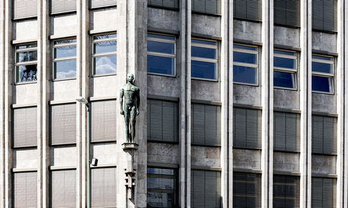 Full frame shot of building with sculpture