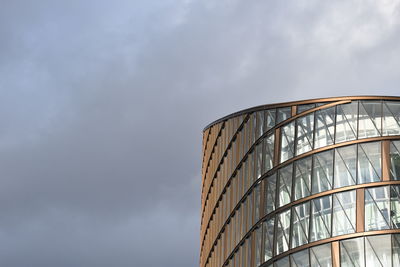 Low angle view of modern building against sky