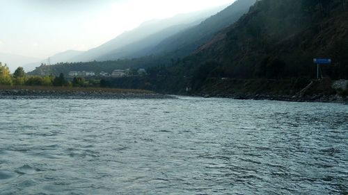 Scenic view of river against sky