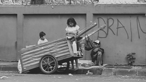 Side view of horse cart on wall