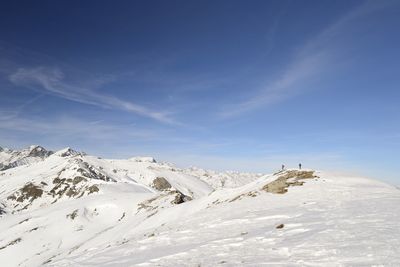 Scenic view of snowcapped mountain against sky