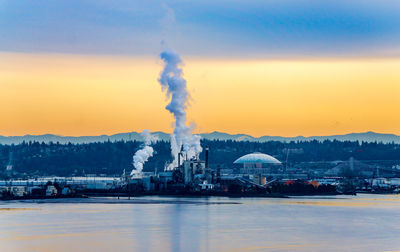 Steam rise from a factory in tacoma, washington.