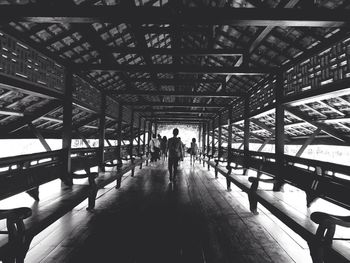 People walking on tiled floor