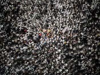 High angle view of group of people in city