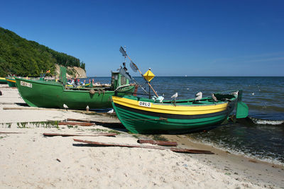 Fishing boats moored at beach