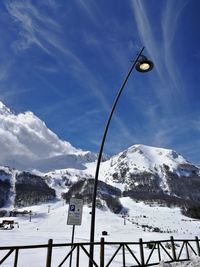 Snow covered mountains against sky