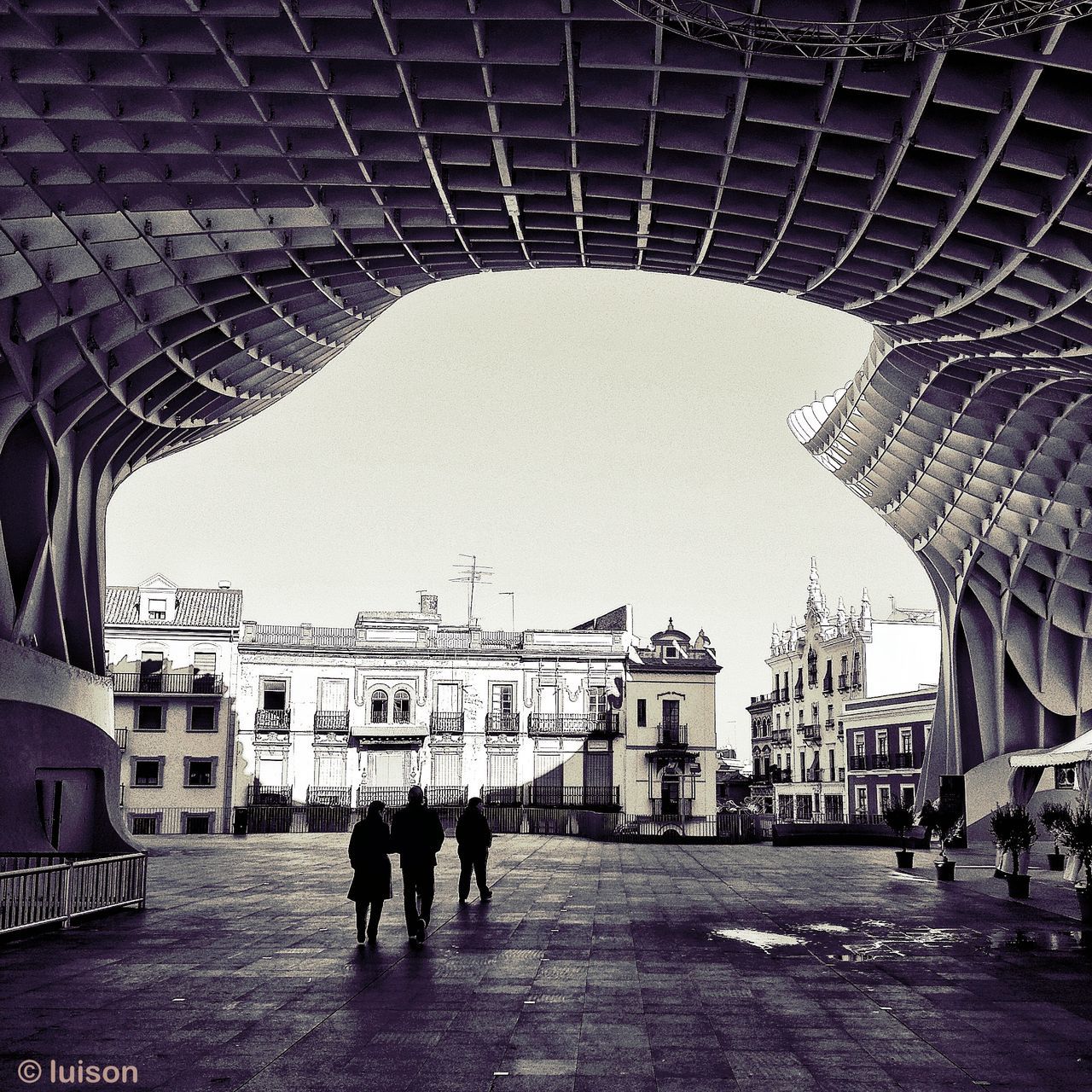 architecture, built structure, building exterior, walking, men, city, street, lifestyles, person, city life, full length, leisure activity, large group of people, city street, road, building, group of people, rear view, shadow