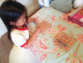 High angle view of cute girl at home