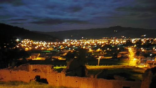 Illuminated cityscape at night