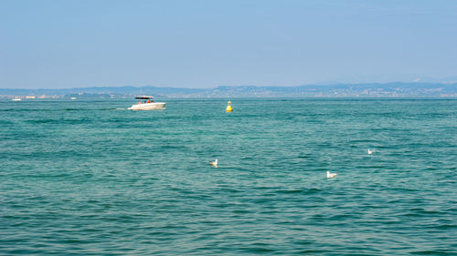 Scenic view of sea against clear sky
