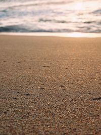 Close-up of sand at beach