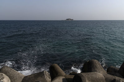 Scenic view of sea against clear sky
