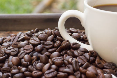 Close-up of coffee beans on table