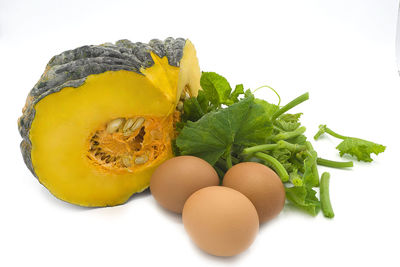 Close-up of fruits against white background