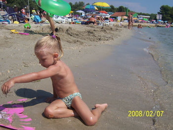 Full length of girl running on beach