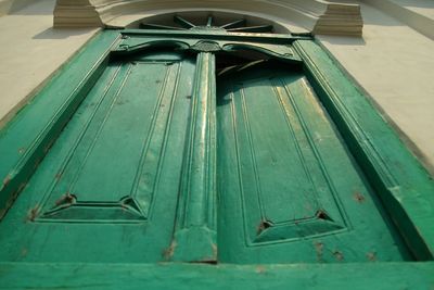 Low angle view of metal door