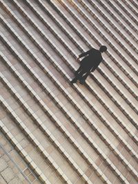 Low angle view of man on staircase