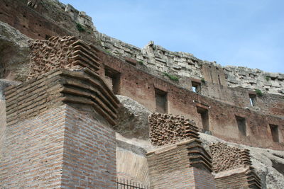 Low angle view of old building against sky