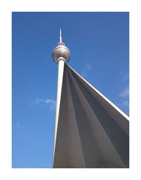 Low angle view of communications tower against clear sky