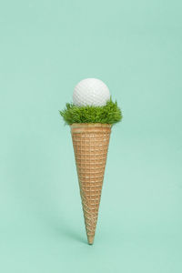 Close-up of ice cream against blue background