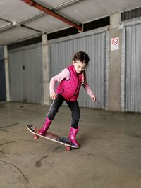 Full length of girl skateboarding
