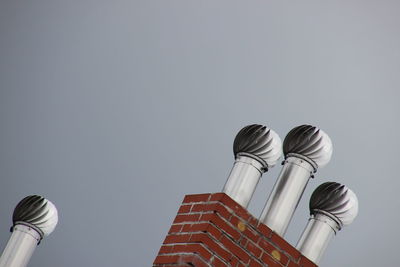 Low angle view of modern building against clear sky