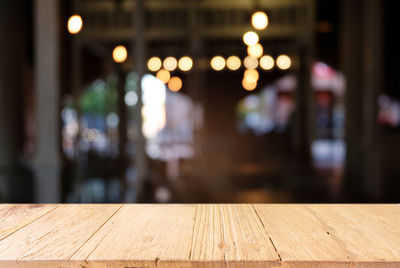 Close-up of wooden table at home