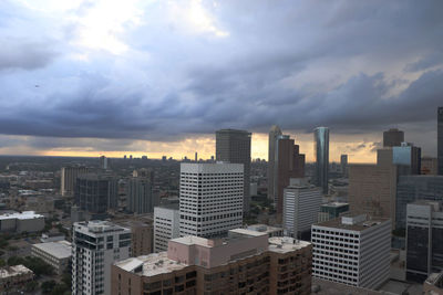 Modern buildings in city against sky