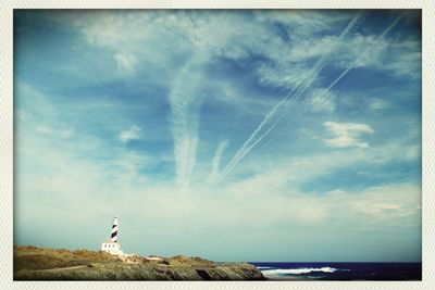 Scenic view of sea against cloudy sky