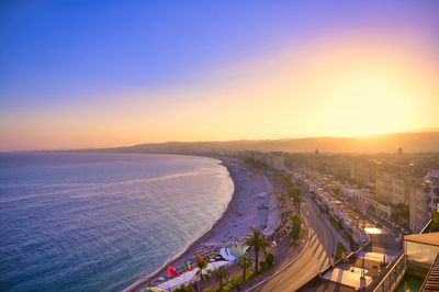 High angle view of cityscape against sky during sunset