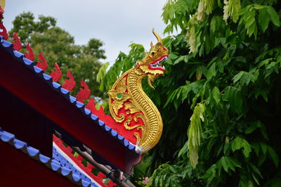 Low angle view of plants against temple