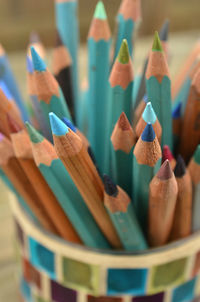 Close-up of colored pencils on table