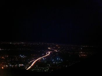 Aerial view of city at night