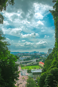 High angle view of townscape against cloudy sky