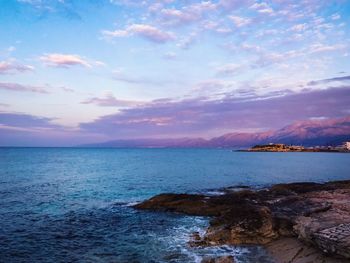 Scenic view of sea against sky at sunset